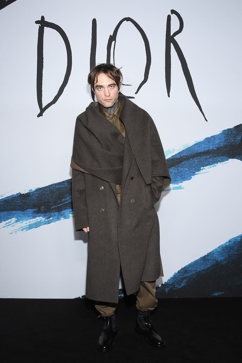 Wearing oversized brown Dior to the Dior Homme Menswear autumn/winter 2019-2020 show on January 18, 2019 in Paris. Getty Images