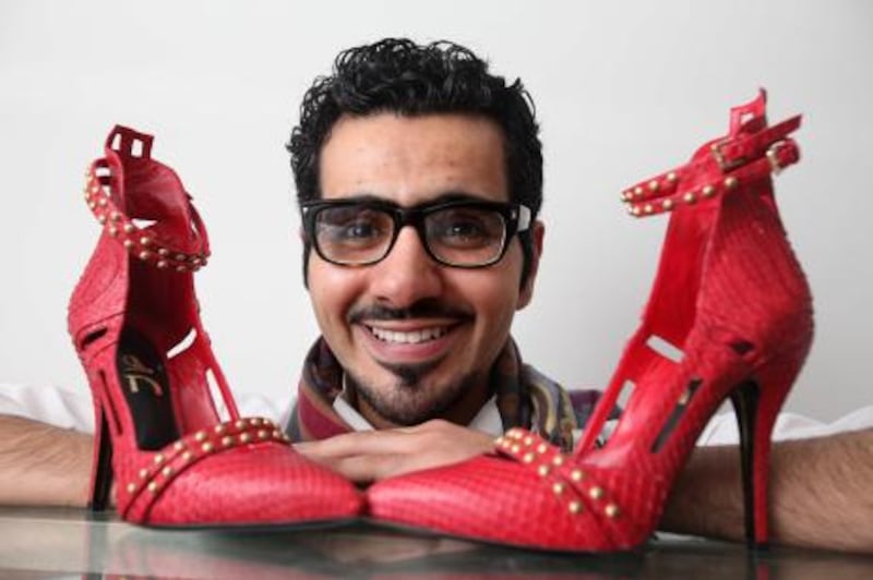 LONDON.10th February 2011.  London based Emirati shoe designer Sultan al Darmaki with a pair of shoes from his new collection.  Stephen Lock for The National FOR  ARTS & LIFE