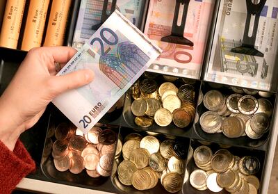Euro coins and banknotes in a shop till in Duisburg, Germany, in 2001. The ECB now plans to redesign its euro banknotes, with a final decision on the new look expected in 2024. AP