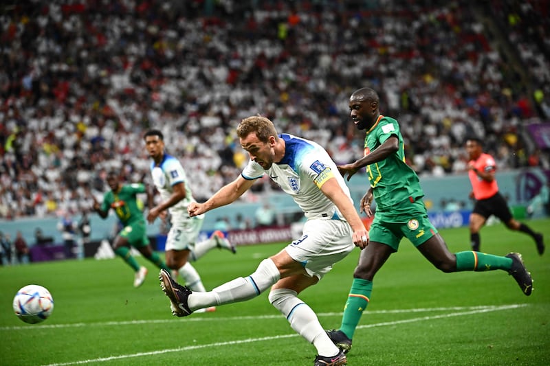 England's Harry Kane scores the second. AFP