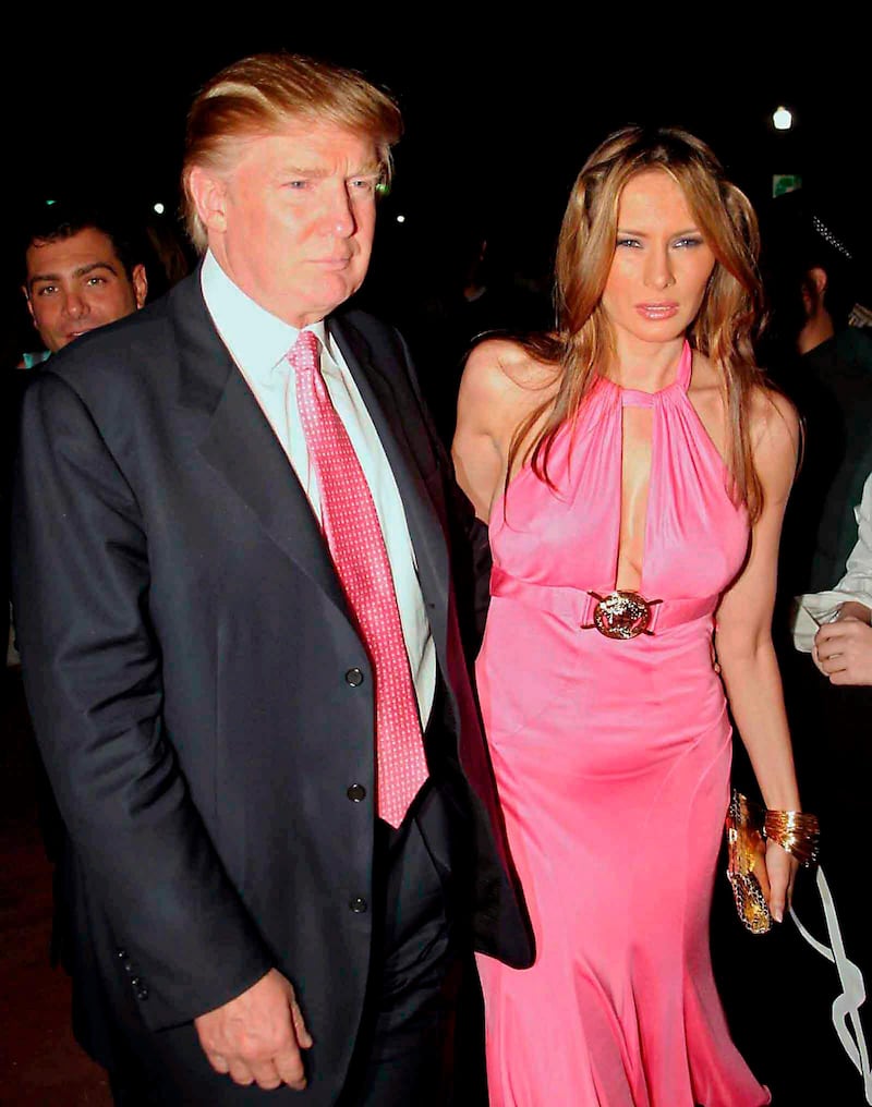 epa000383687 Donald Trump and his wife Melania Knauss arrive at the birthday party of Miami Heat player, Shaquille O'Neal at Hotel Victoria in Miami Beach, Florida, United States on Saturday 05 March 2005. Cuban music producer Emilo Estefan, Heat players Damon Jones and Eddie Jones and baseball player, Dominican Sammy Sosa also attended the party.  EPA/fotomiami