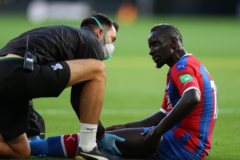Crystal Palace's Mamadou Sakho receives treatment after picking up an injury early in the game against Wolves. AFP