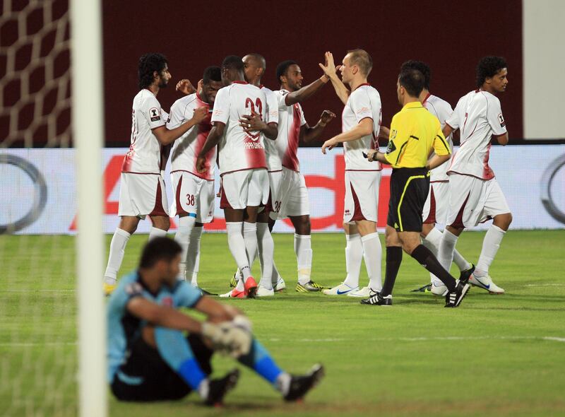 ABU DHABI - UNITED ARAB EMIRATES - 10OCT2012 - AL Wahda team celebrates after scoring second goal against Al Shaab during Etisalat Cup match yesterday at Al Wahda club in Abu Dhabi. Ravindranath K / The National 