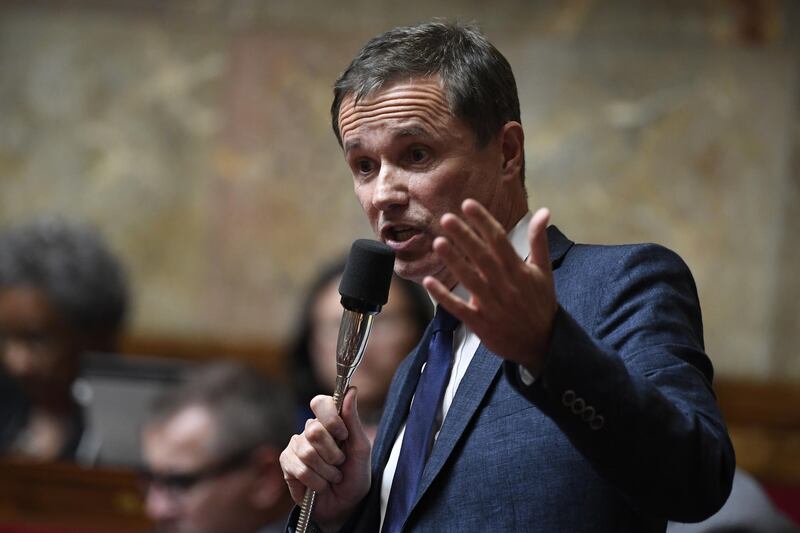 French Member of Parliament and president of the French right-wing Debout la France (DLF) party Nicolas Dupont-Aignan speaks  during a session of questions to the Government at the French National Assembly in Paris on June 5, 2018.  / AFP PHOTO / Bertrand GUAY