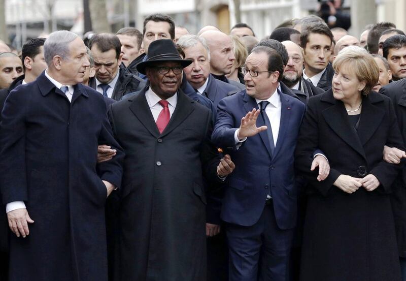 Israeli prime minister Benjamin Netanyahu stands with Malian president Ibrahim Boubacar Keita, French president Francois Hollande and German chancellor Angela Merkel at Paris' unity rally on January 11, after being seen to push his way to the front. Philippe Wojazer, Pool/AFP Photo


