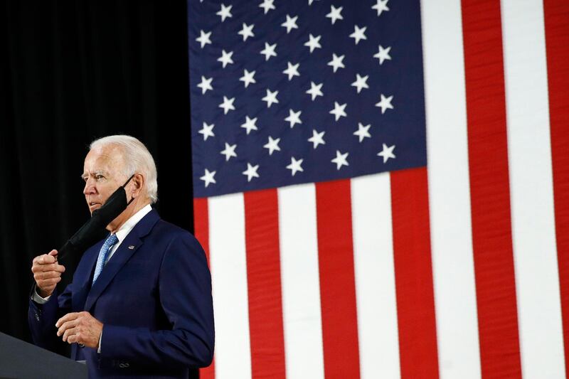 Democratic presidential candidate, former Vice President Joe Biden, removes a face mask to protect against the spread of the coronavirus in Wilmington, Delaware this week. AP Photo