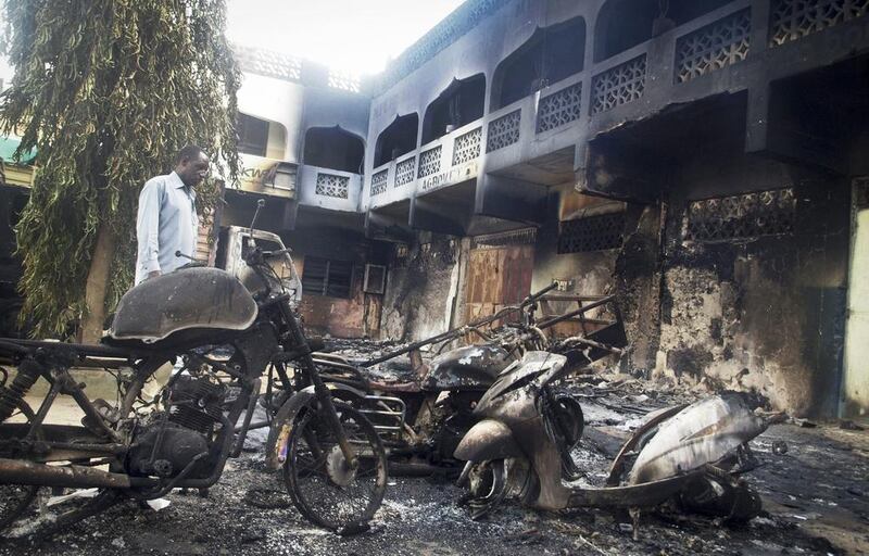 Dozens of suspected Somali extremists wielding automatic weapons attacked the small Kenyan coastal town of Mpeketoni on June 16, 2014, attacking police stations, setting fire on hotels, and spraying bullets into the street killing at least 49 people. AP Photo