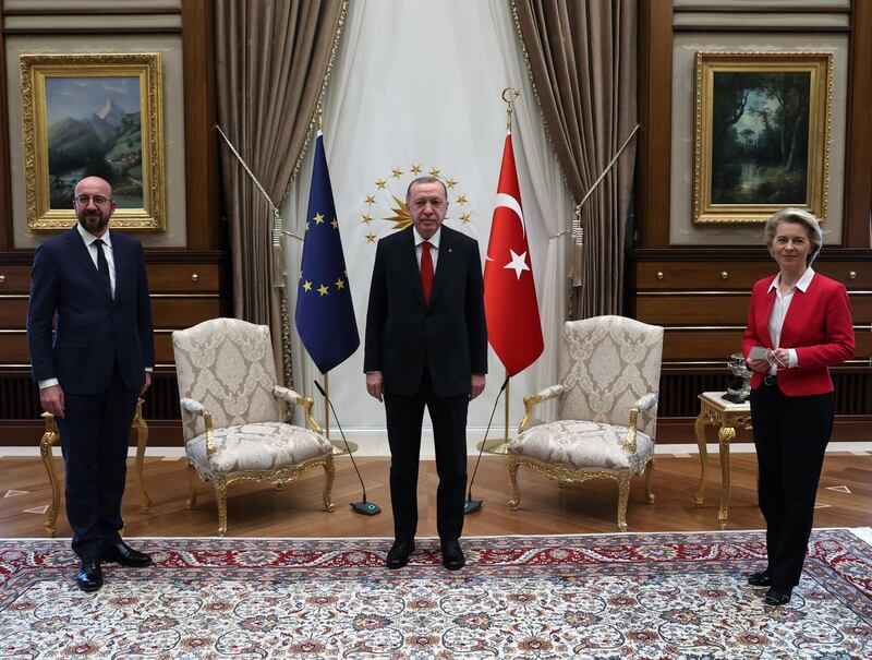 epa09118484 A handout photo made available by Turkish President Press Office shows, Turkish President Recep Tayyip Erdogan (C), EU Council President Charles Michel (L) and President of EU Commission Ursula Von der Leyen (R) pose before their meeting at the Presidential Place in Ankara, Turkey, 06 April 2021.  EPA/PRESIDENTAL PRESS OFFICE HANDOUT  HANDOUT EDITORIAL USE ONLY/NO SALES