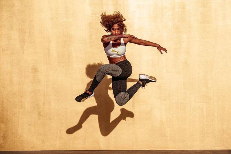 Puma has launched its women's Gold Pack collection, which features a gold version of training shoe The Fierce, as well as gold-detailed sports bra and tights. Courtesy Puma