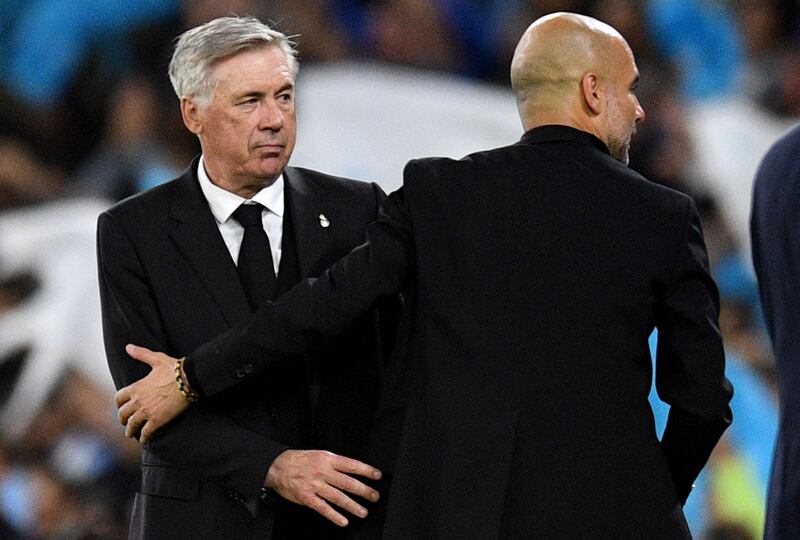 Carlo Ancelotti greets Pep Guardiola after the Champions League semi-final second leg between Real Madrid and Manchester City. AFP