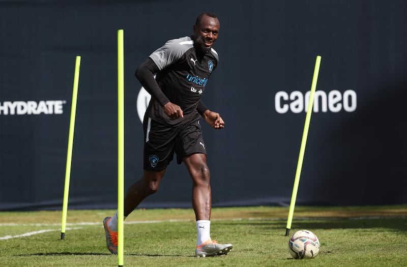 Track legend and World XI's captain Usain Bolt during training for Soccer Aid 2022. Reuters