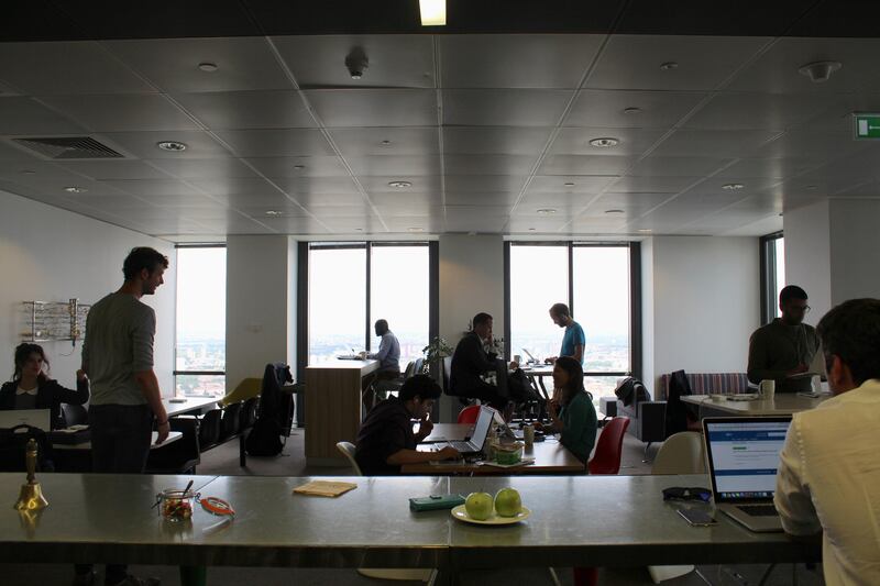 FILE PHOTO: People are seen in the Level39 FinTech hub based in the One Canada Square tower of the Canary Wharf district of London, Britain, August 5, 2016. REUTERS/Jemima Kelly/File Photo