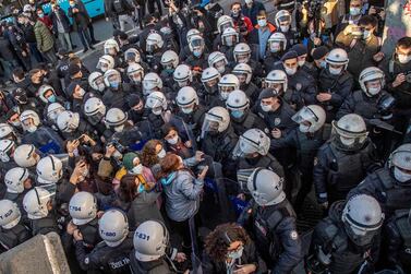 Turkish police officers detain protesters during a rally in Istanbul. Bogazici University students are protesting against the appointment of a ruling party loyalist as rector. AFP