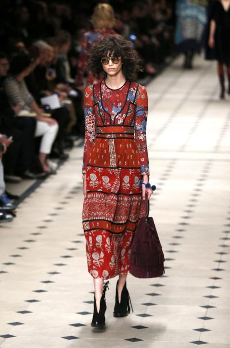 BURBERRY, FEBRUARY 23, 1PM, LONDON. Christopher Bailey’s “Patchwork, Pattern and Prints” show was a medley of muted tones, florals and fringing. Alastair Grant / AP photo