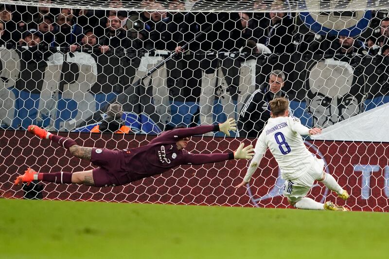 Manchester City goalkeeper Ederson makes a save from FC Copenhagen's Isak Bergmann Johannesson.  EPA 