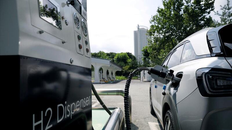 A Hyundai Motor's Nexo hydrogen car is fuelled at a hydrogen station in Seoul, South Korea. Irena suggests that costs for green hydrogen could fall to a level that makes it competitive with other fuels within a decade. Reuters