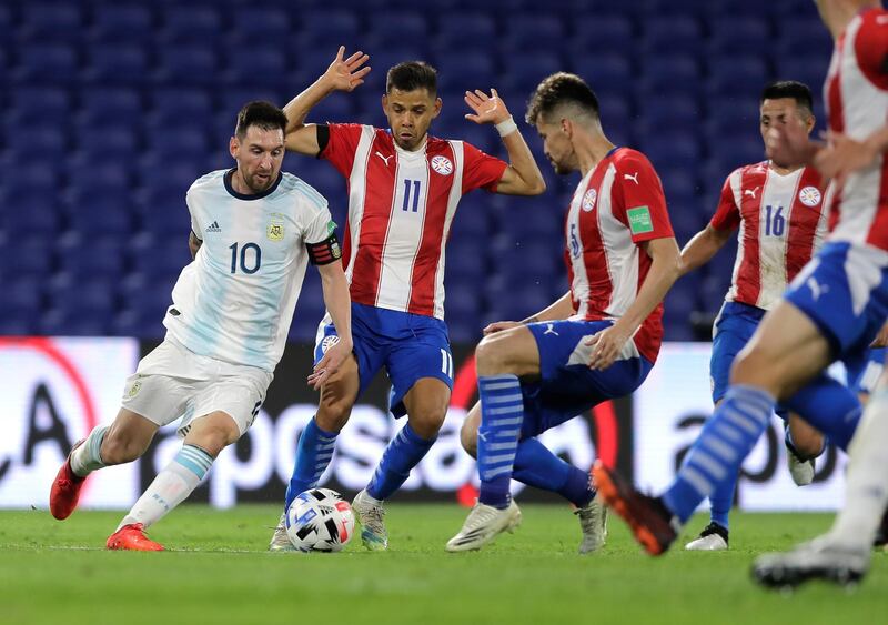 Argentina's Lionel Messi on the attack against Paraguay. AP