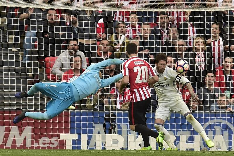 Real Madrid goalkeeper Keylor Navas, left, and Sergio Ramos, fail to block the ball as Athletic Bilbao’s Aritz Aduriz scores. Alvaro Barrientos / AP Photo