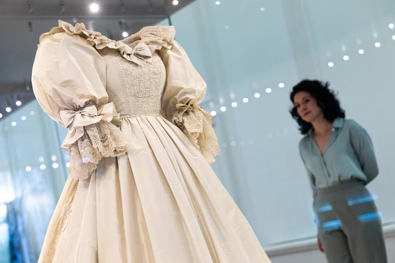 To include the dress in the exhibition, organisers had to seek permission from Princes Harry and William. Getty Images