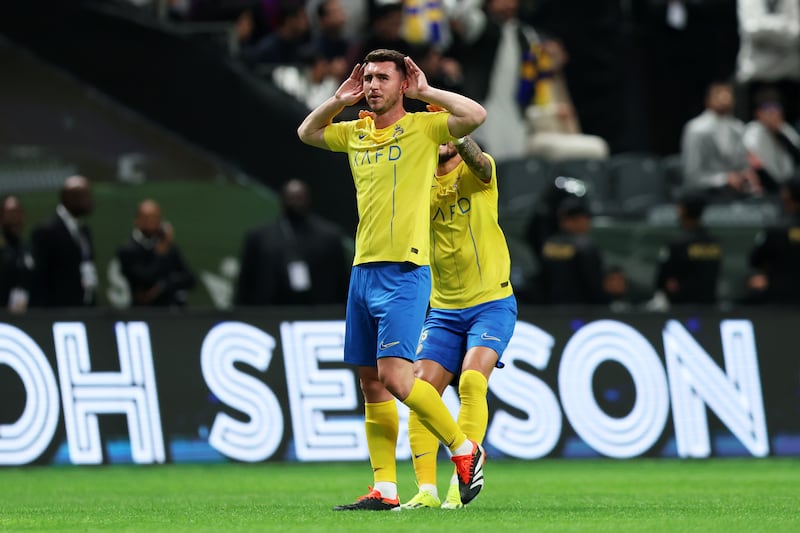 Aymeric Laporte of Al Nassr celebrates scoring his team's third goal, a superb free kick from inside his own half. AFP