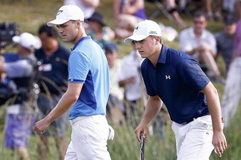 Martin Kaymer, left, and Jordan Spieth share the lead at the Players Championship on a tough day for golfers. Erik S Lesser / EPA