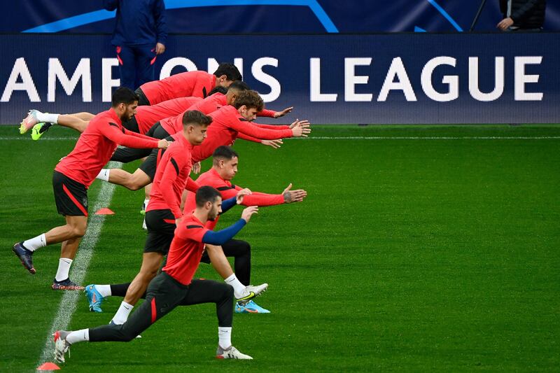 Atletico Madrid players take part in a training session in Madrid. AFP