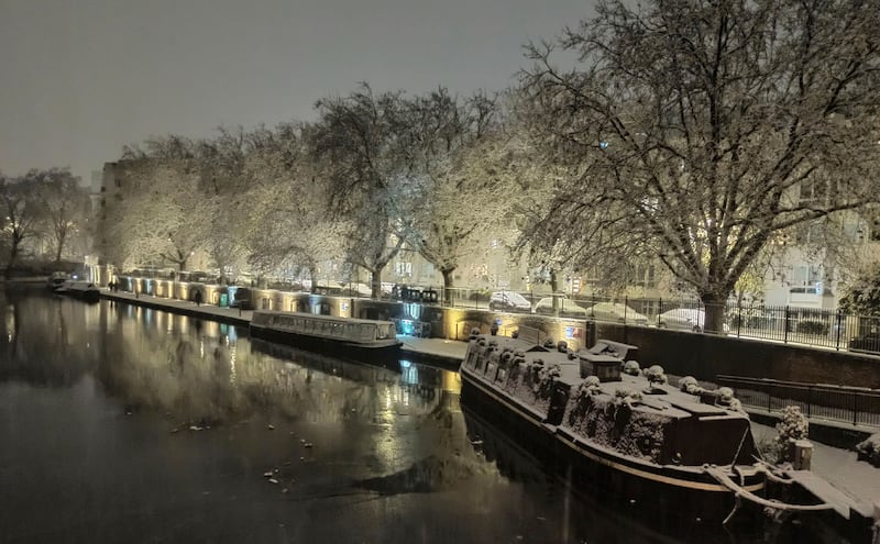 Snow has fallen across the UK. Trees and boats blanketed in Little Venice, London. AP