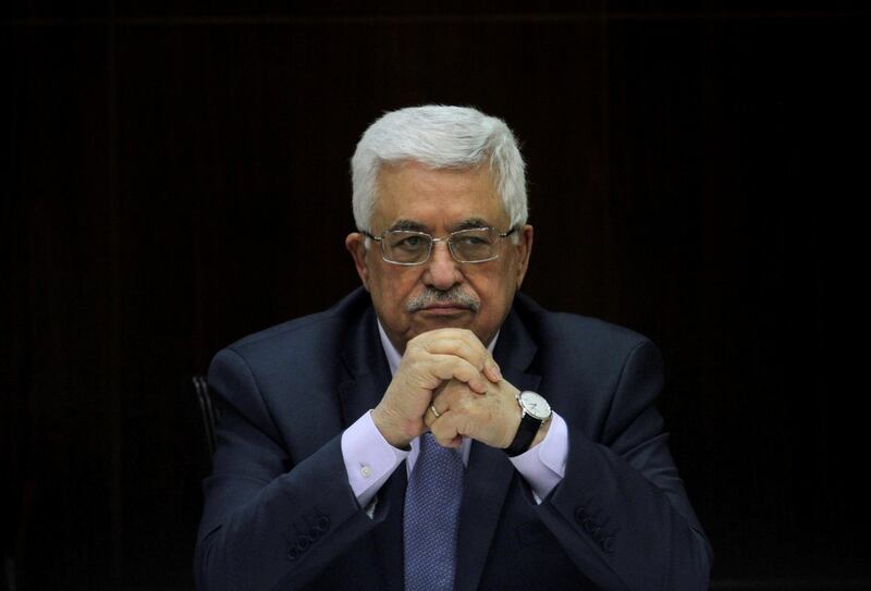 FILE PHOTO -  Palestinian President Mahmoud Abbas heads a Palestinian cabinet meeting in the West Bank city of Ramallah July 28, 2013. REUTERS/Issam Rimawi/Pool/File Photo