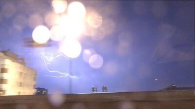 Lightning struck in the capital as the UAE was battered by heavy rain and fierce winds. Charles Capel / The National