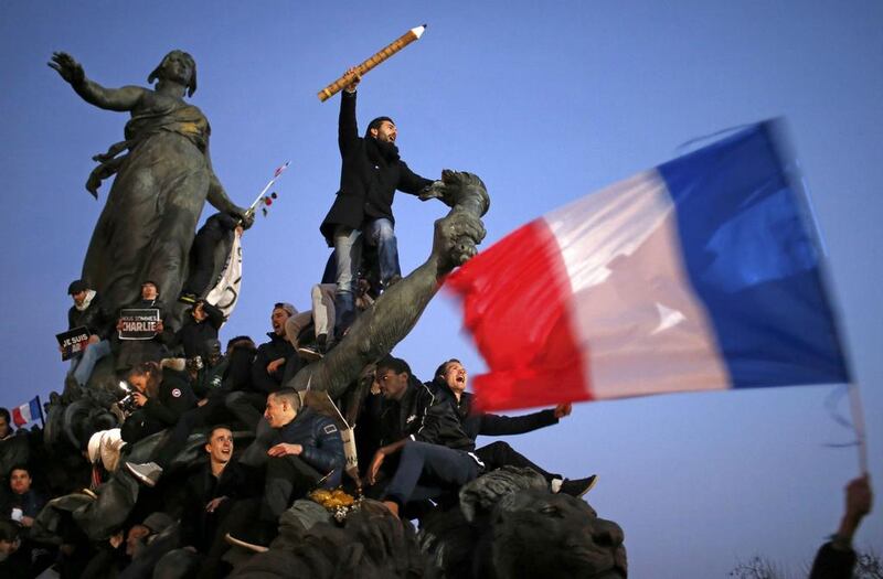 Parisians rallied on Sunday in solidarity with the victims of the attack on the Charlie Hebdo offices. Readers say we must oppose terrorism wherever it happens. Stephane Mache / Reuters