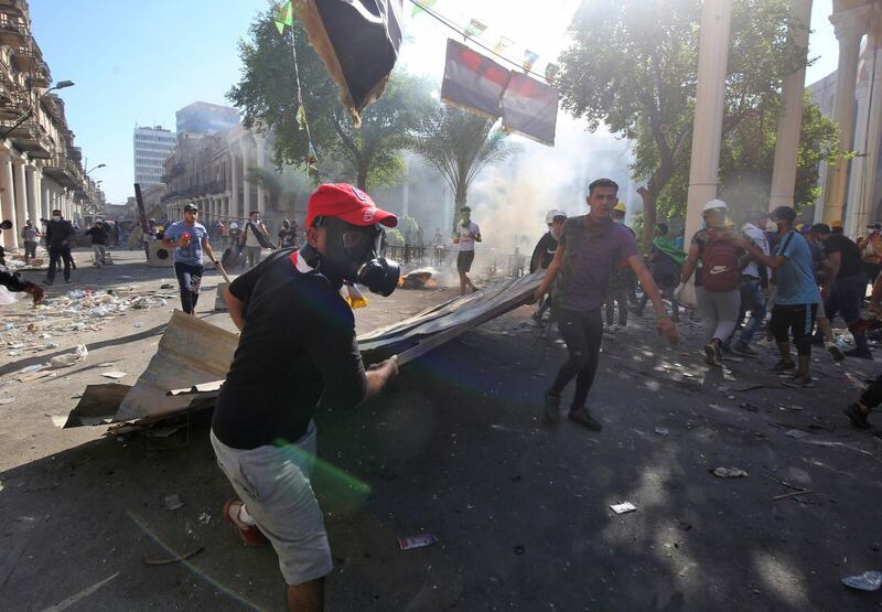 Iraqi demonstrators clash with security forces in the capital Baghdad on November 8. AFP