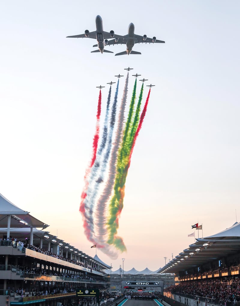 Abu Dhabi, United Arab Emirates, December 1, 2019.  
Formula 1 Etihad Airways Abu Dhabi Grand Prix.
--  Etihad Airways Fly Past & Aerobatic Display by Al Fursan during the UAE national anthem.
Victor Besa / The National
Section:  SP
Reporter:  Simon Wilgress-Pipe