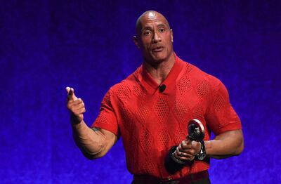 Dwayne 'The Rock' Johnson receiving the Entertainment Icon of the Decade Award at CinemaCon 2022. AFP