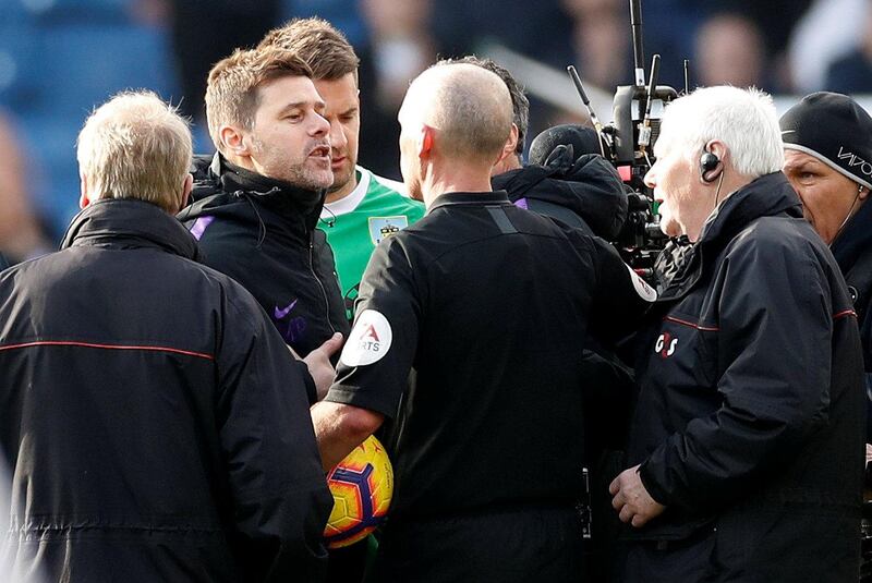 Soccer Football - Premier League - Burnley v Tottenham Hotspur - Turf Moor, Burnley, Britain - February 23, 2019  Tottenham manager Mauricio Pochettino remonstrates with referee Mike Dean after the match          Action Images via Reuters/Carl Recine  EDITORIAL USE ONLY. No use with unauthorized audio, video, data, fixture lists, club/league logos or "live" services. Online in-match use limited to 75 images, no video emulation. No use in betting, games or single club/league/player publications.  Please contact your account representative for further details.