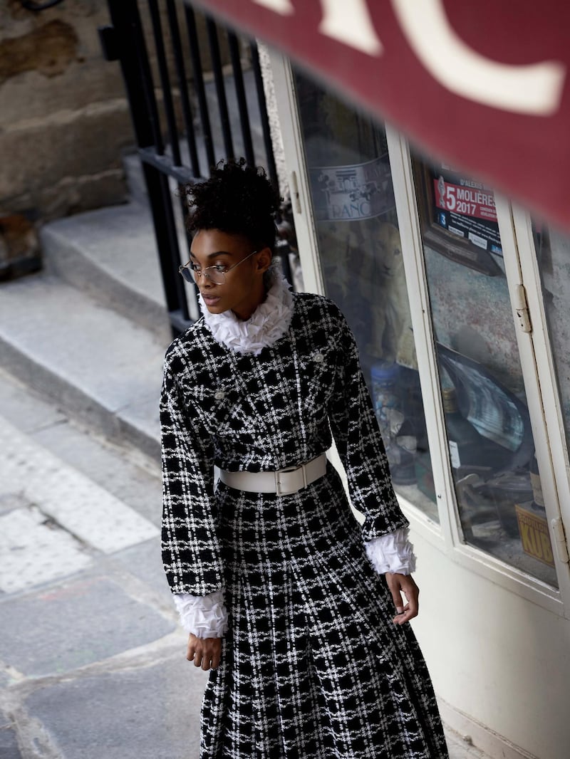 through the lens: Photography | Chantelle Dosser fashion director | Sarah Maiseybelted dress in checked tweed with an embroidered mock turtleneck and patch-flap pockets; and rounded spectacles, both from Chanel Haute Couture