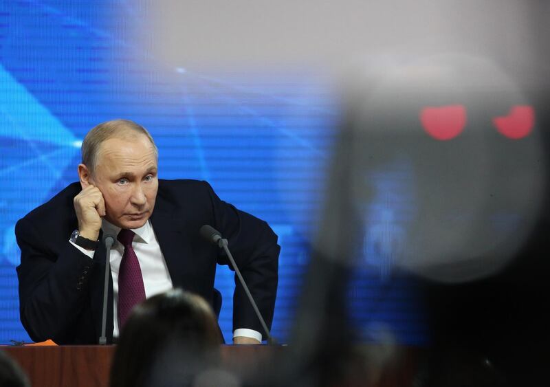 Vladimir Putin, Russia's president, listens to a question from the audience during his annual news conference in Moscow, Russia, on Thursday, Dec. 20, 2018. Putin said Russia is expected to exceed 4% CPI target in 2018. Photographer: Andrey Rudakov/Bloomberg