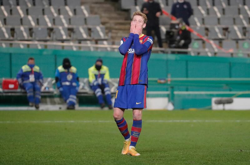 Barcelona's Frenkie de Jong after missing a penalty during the shootout. Reuters