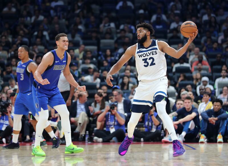 Karl-Anthony Towns of Minnesota gathers the ball during the game between the Minnesota Timberwolves and Dallas Mavericks in a pre-season NBA game as part of the Abu Dhabi Games 2023 at Etihad Arena, Abu Dhabi. All photo: Chris Whiteoak / The National