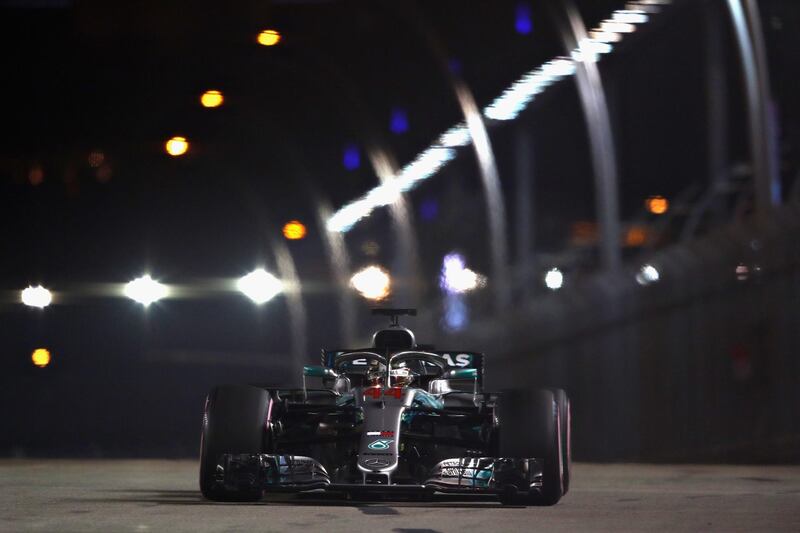 SINGAPORE - SEPTEMBER 15: Lewis Hamilton of Great Britain driving the (44) Mercedes AMG Petronas F1 Team Mercedes WO9 on track during qualifying for the Formula One Grand Prix of Singapore at Marina Bay Street Circuit on September 15, 2018 in Singapore.  (Photo by Lars Baron/Getty Images)