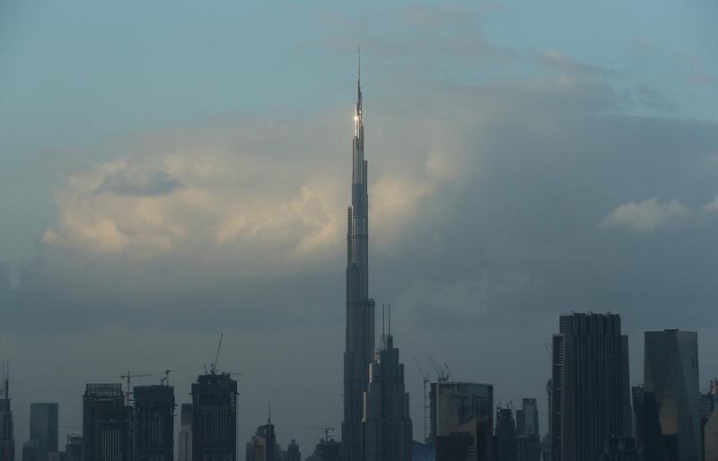 DUBAI , UNITED ARAB EMIRATES , November 24 – 2020 :- Burj Khalifa during the early morning cloudy weather in Dubai. ( Pawan Singh / The National ) For News/Standalone/Instagram/Big Picture