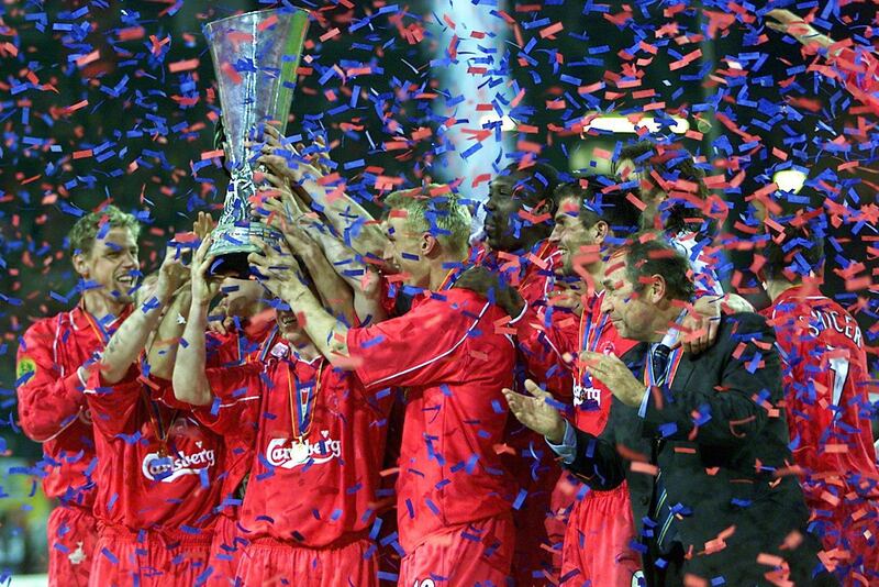 Liverpool manager Gerard Houllier and players celebrate after winning the Uefa Cup final against Deportivo Alaves at the Westfalen Stadium in Dortmund on Wednesday, 16 May 2001. EPA