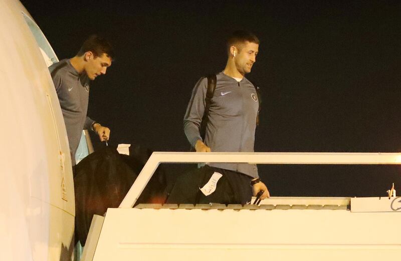 Andreas Christensen and Gary Cahill step off the plane after arriving in Baku. Reuters