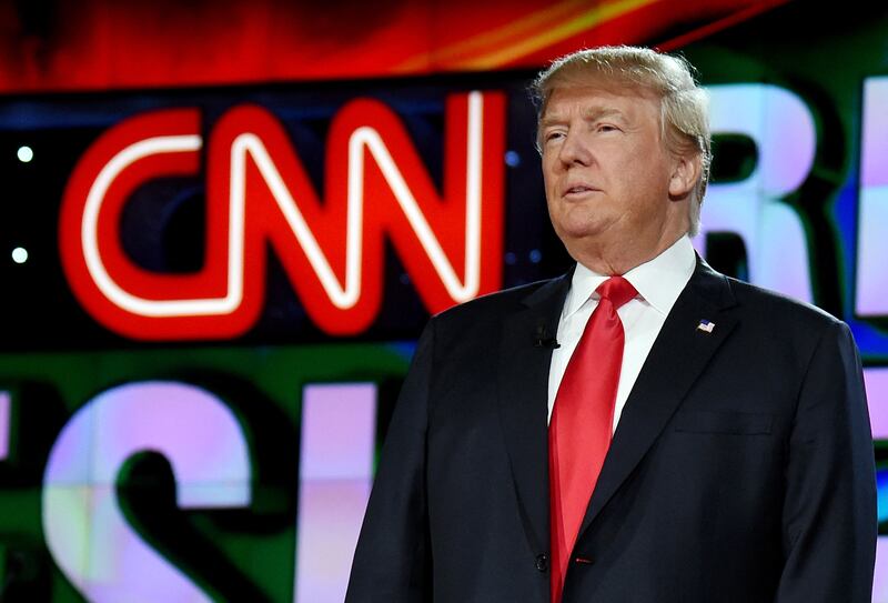 Donald Trump is introduced during the CNN presidential debate in 2015. The former US president is now suing the network for defamation. AFP