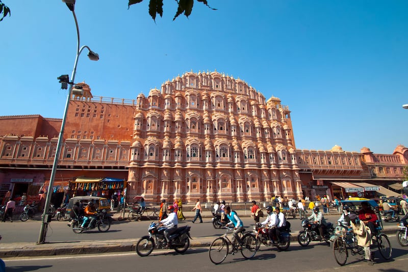 Hawa Mahal or Palace of Winds in Jaipur, India. Hawa Mahal was built of red and pink sandstone in 1799 by Maharaja Sawai Pratap Singh in the form of the crown of Krishna, the Hindu god. The original intention of this unique five-storey building with its 953 small windows that are decorated with intricate latticework was to allow royal ladies to observe everyday life in the street below without being seen. (Getty Images) *** Local Caption ***  wk25de-tr-mkop-jaipur.jpg
