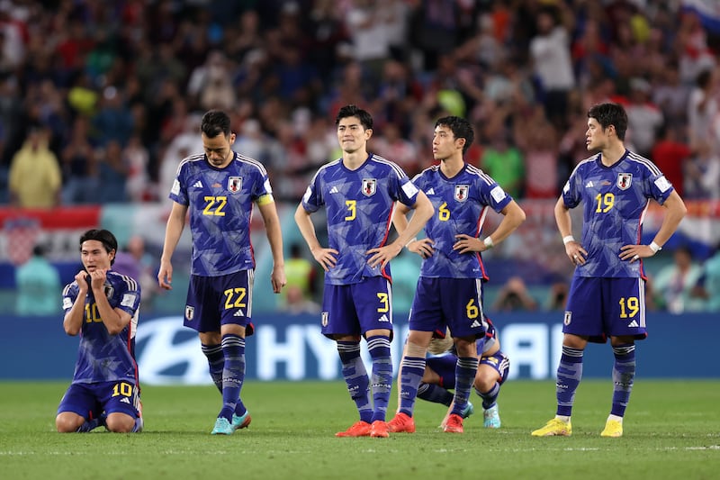 Dejected Japan players after their defeat to Croatia in Qatar. Getty