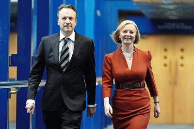 Prime Minister Liz Truss and her husband, Hugh O'Leary, arrive for the Conservative Party annual conference at the International Convention Centre in Birmingham. PA