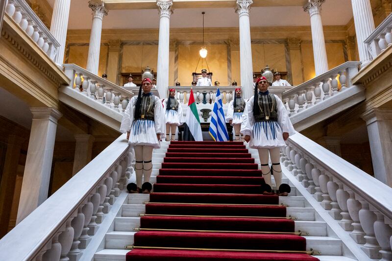 Greek honour guards stand during a reception at the Presidential Mansion in Athens.