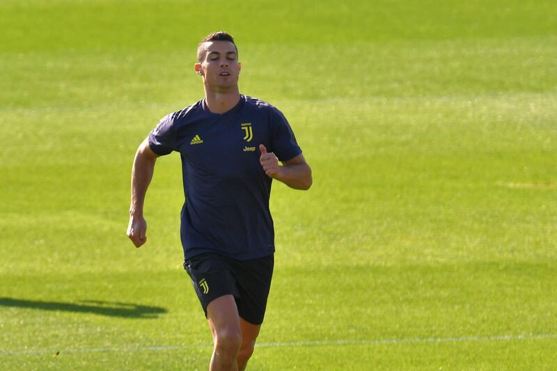 Cristiano Ronaldo runs during a training session at the Juventus Continassa training centre in Turin. AFP