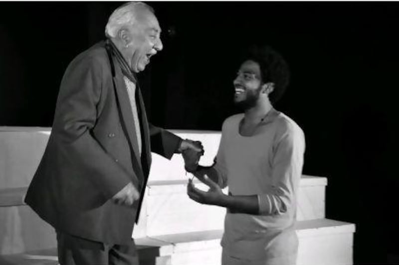 From left, the actors Sami Abdulhameed, who plays a teacher, and Ahmed Salah Moneka, who plays Romeo, in a scene from Monadhil Daood's version of Shakespeare's Romeo and Juliet.