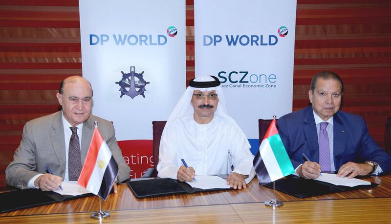 Sultan Ahmed Bin Sulayem, DP World Group Chairman and CEO (centre) with Admiral Mohab Mamish, Chairman of the Suez Canal Economic Zone and Rear Admiral Mohamed Ahmad Ibrahim Youssef, Chairman of the Holding Company of Maritime and Land Transport, at the signing in Dubai of an agreement to develop trade infrastructure. Courtesy DP World.